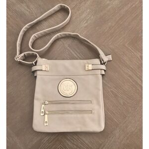 Michael Kors Beige Leather Shoulder Bag With Gold Accents And Multiple Pockets